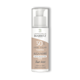 Un flacon de crème solaire teintée de la marque Laboratoires de Biarritz