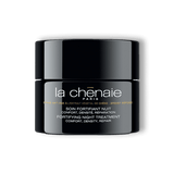 Un pot en plastique noir de soin fortifiant nuit La Chênaie, une crème de nuit anti-âge et réparatrice